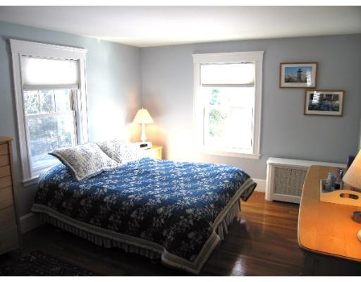81 Gleason Road Lexington, MA 02420 - Photo 14 of 18 a bedroom with a bed and a window