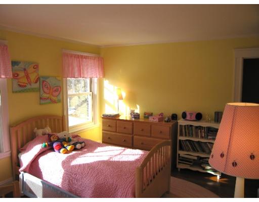 81 Gleason Road Lexington, MA 02420 - Photo 18 of 18 a bed room with a bed and a window