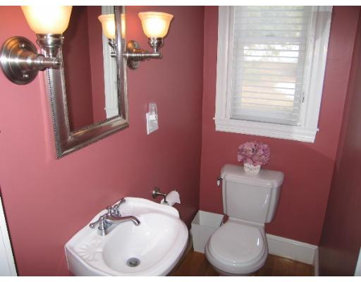 81 Gleason Road Lexington, MA 02420 - Photo 10 of 18 a bathroom with a sink mirror and toilet