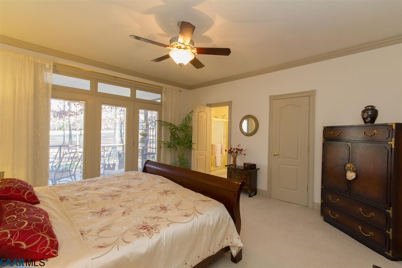 21 Out Of Bounds Road Palmyra, VA 22963 - Photo 20 of 38 Your Master Suite offers 9-ft Ceiling, Large Walk-in Closet with Shelving, Walk-out to Screened Porch
