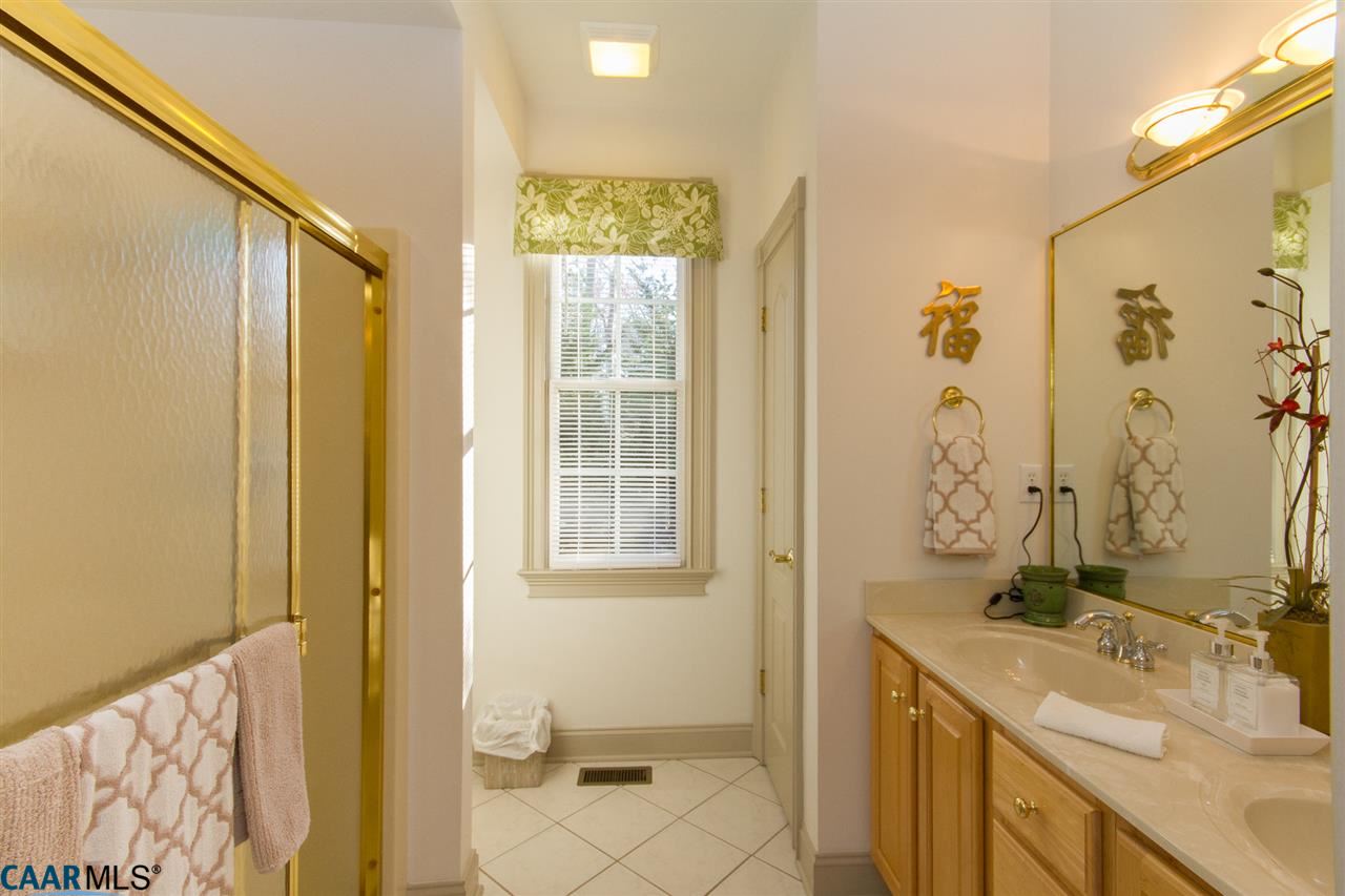 21 Out Of Bounds Road Palmyra, VA 22963 - Photo 22 of 38 Double Vanities, Tiled Floor, Step-in Seated Shower