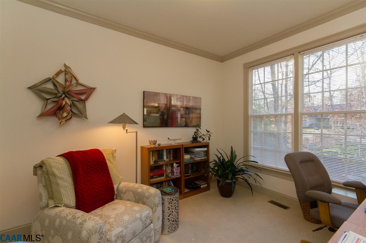 21 Out Of Bounds Road Palmyra, VA 22963 - Photo 24 of 38 Used as Home Office, this room features a unique ceiling exhaust fan should you want to work on crafts or painting in this light-filled room