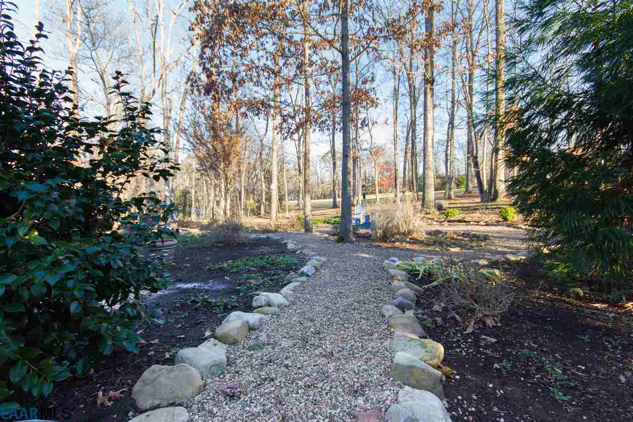 21 Out Of Bounds Road Palmyra, VA 22963 - Photo 31 of 38 Stone pathways and lush blooming gardens were designed to remind owner of her home back in Ireland.