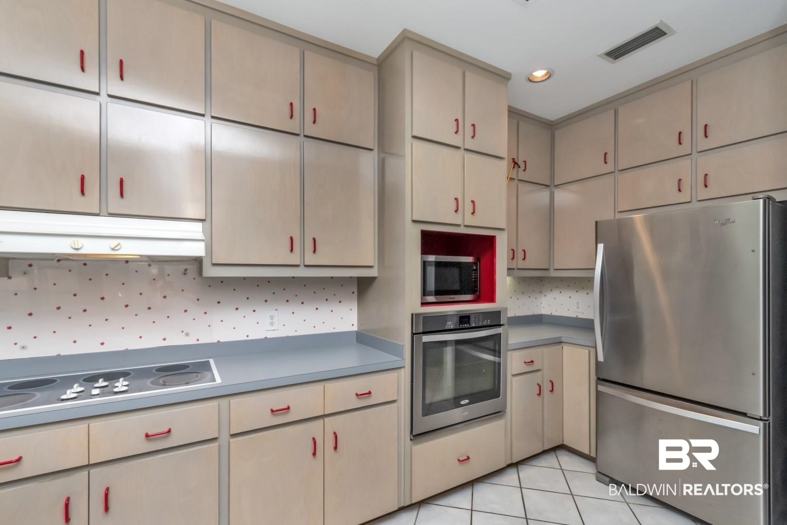 1205 Hillcrest Crossing East Mobile, AL 36695 - Photo 20 of 40 Kitchen featuring appliances with stainless steel finishes and light tile patterned flooring