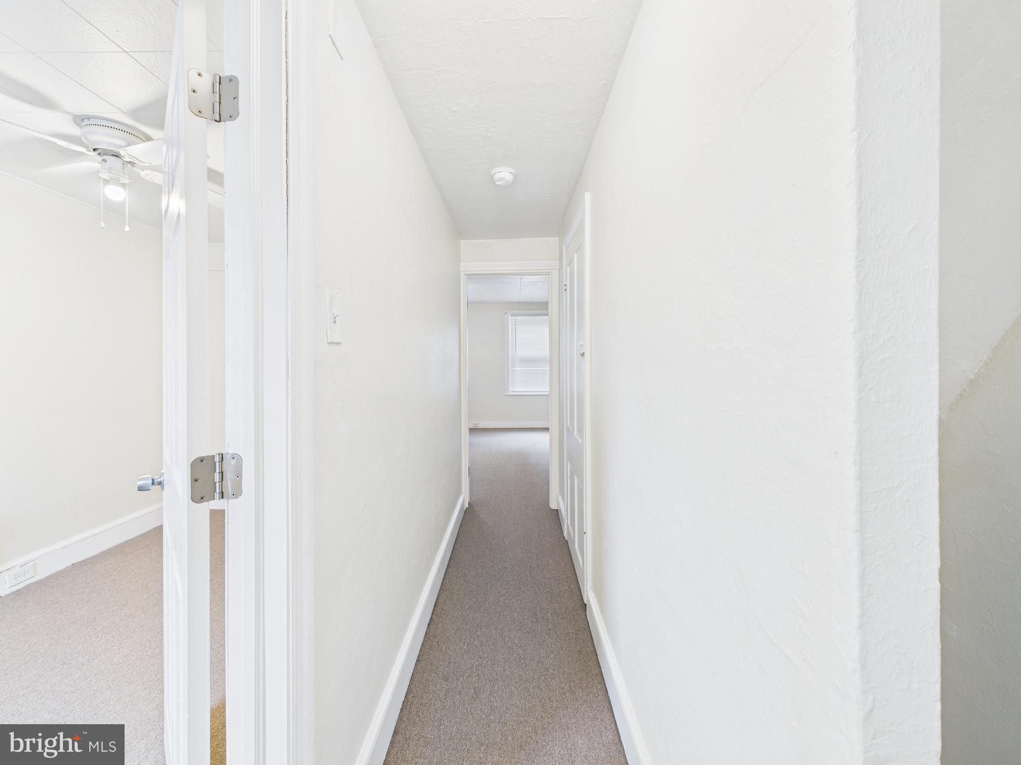 1825 Carlton Street Philadelphia, PA 19103 - Photo 12 of 28 a view of a hallway with wooden floor