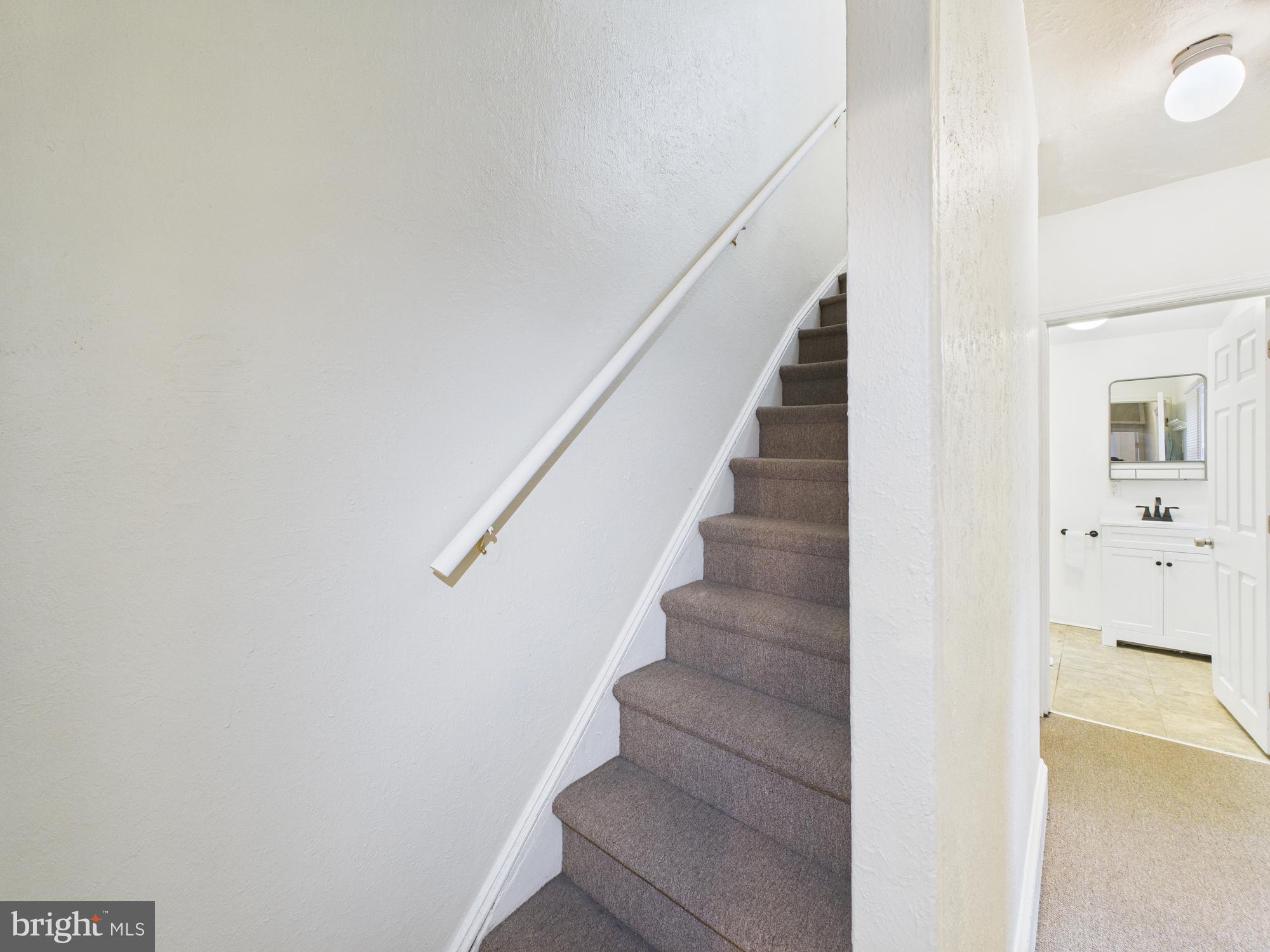 1825 Carlton Street Philadelphia, PA 19103 - Photo 17 of 28 a view of staircase with white walls and white walls