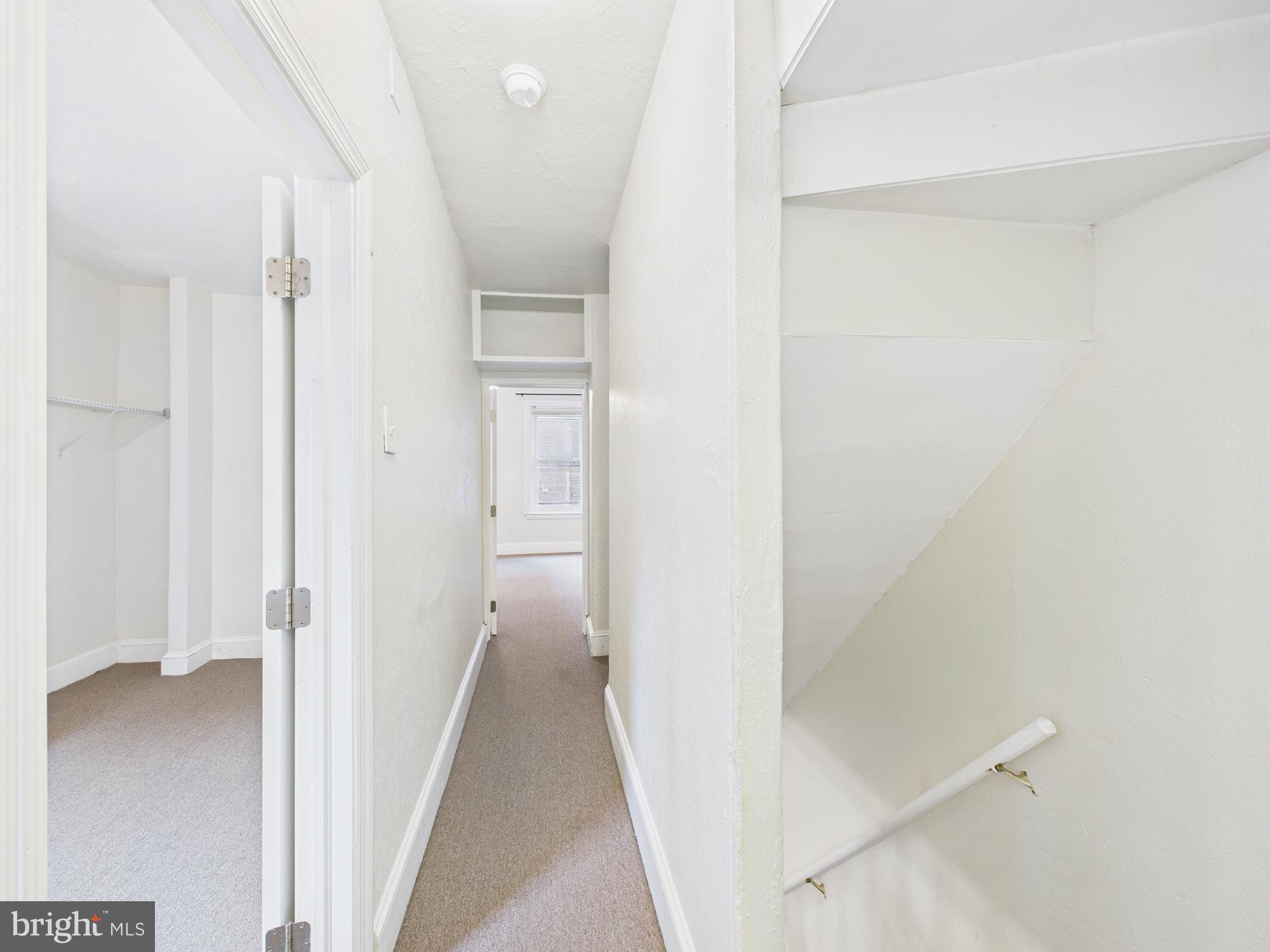 1825 Carlton Street Philadelphia, PA 19103 - Photo 20 of 28 a view of a hallway with a white walls