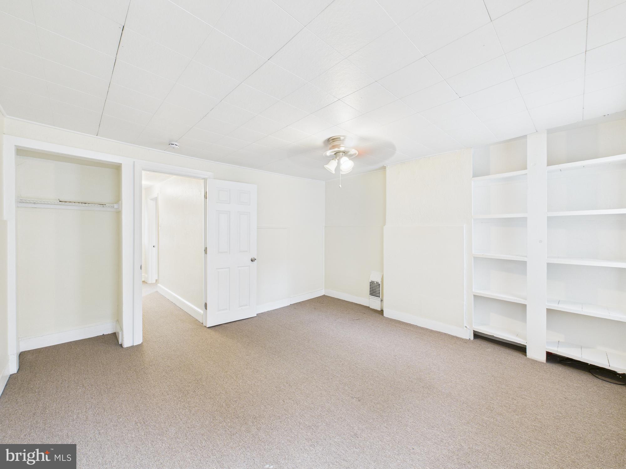1825 Carlton Street Philadelphia, PA 19103 - Photo 23 of 28 a view of an empty room with a cabinet