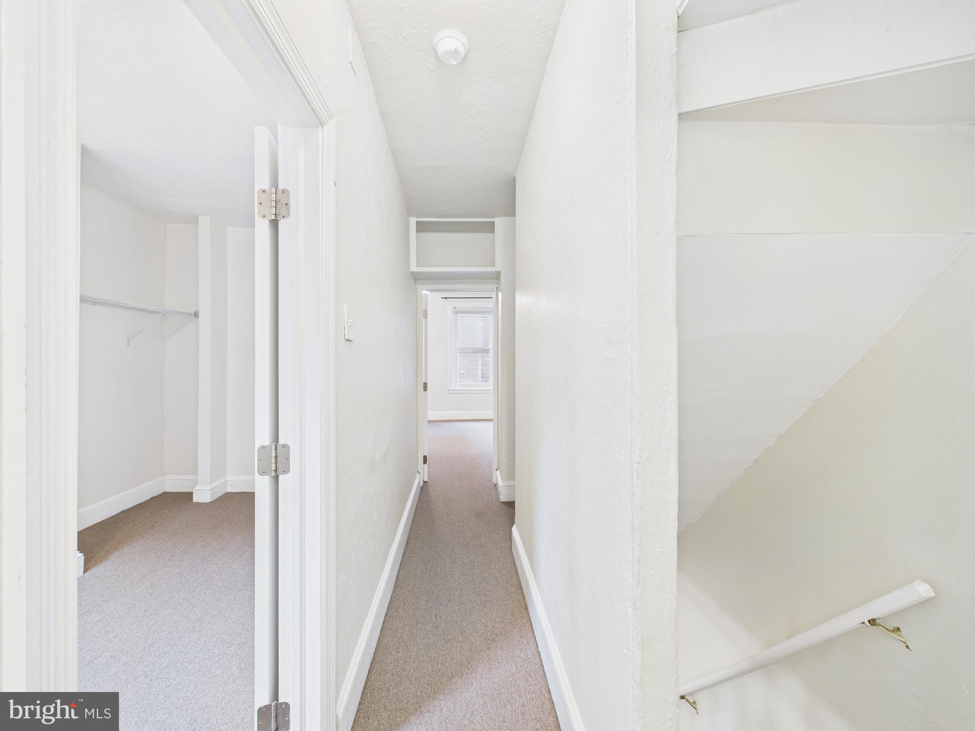 1825 Carlton Street Philadelphia, PA 19103 - Photo 7 of 28 a view of a hallway with a white walls