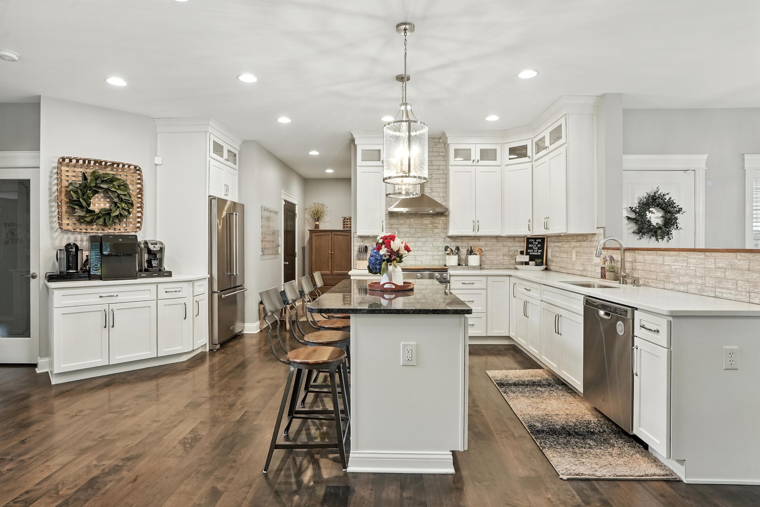 1285 Greenview Place Crown Point, IN 46307 - Photo 12 of 51 a kitchen with a sink stainless steel appliances and cabinets