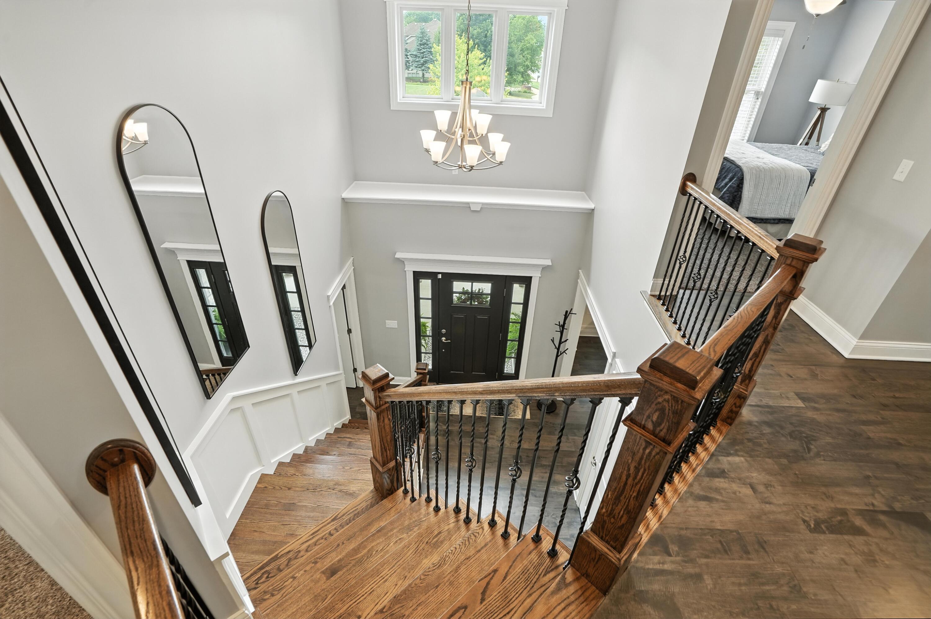 1285 Greenview Place Crown Point, IN 46307 - Photo 19 of 51 a view of staircase with white walls and a window