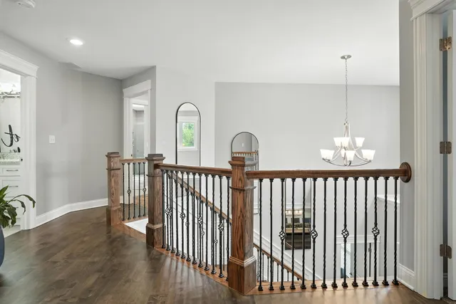 a view of a balcony with wooden floor