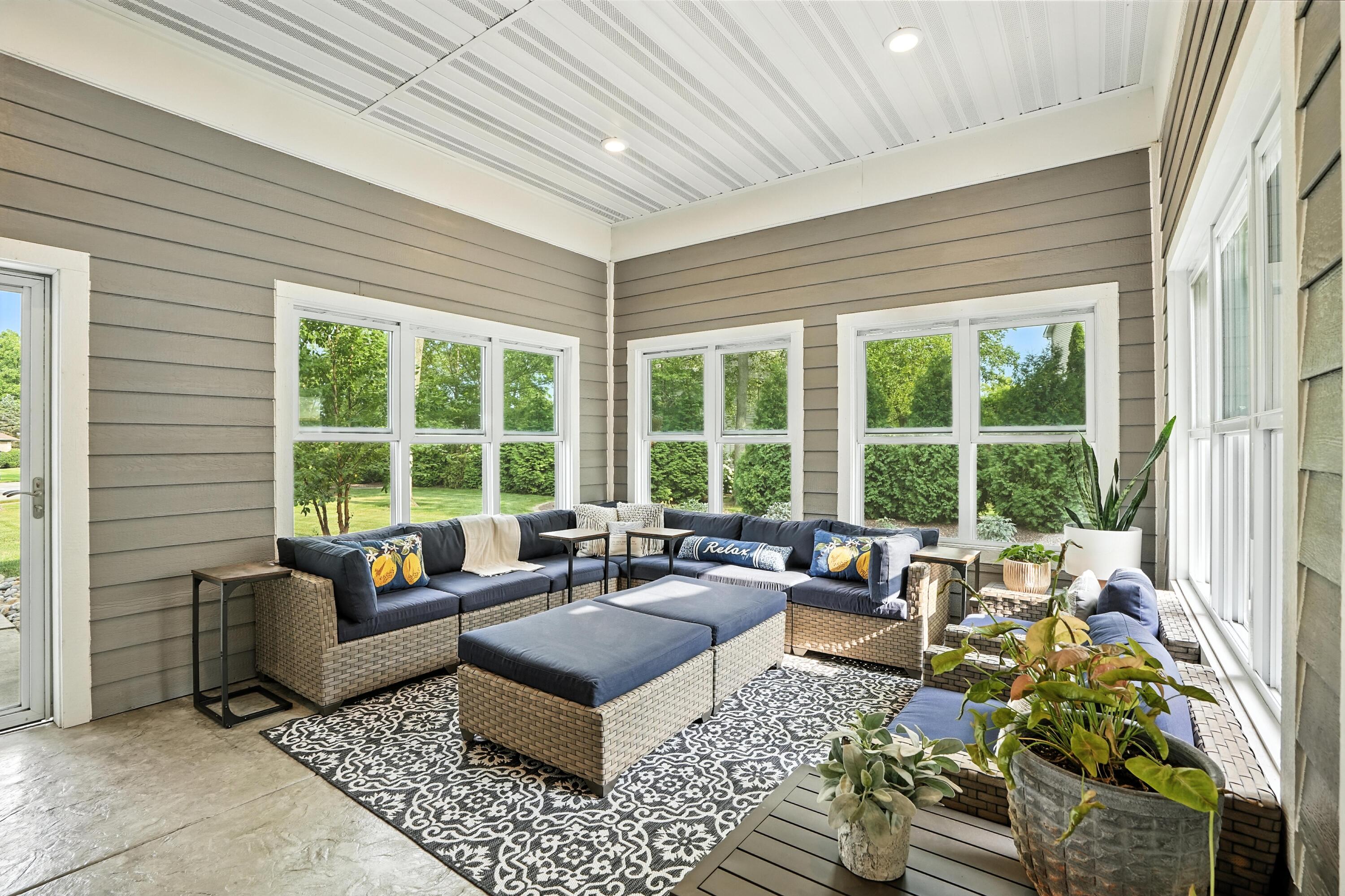 1285 Greenview Place Crown Point, IN 46307 - Photo 41 of 51 a living room with furniture and floor to ceiling windows