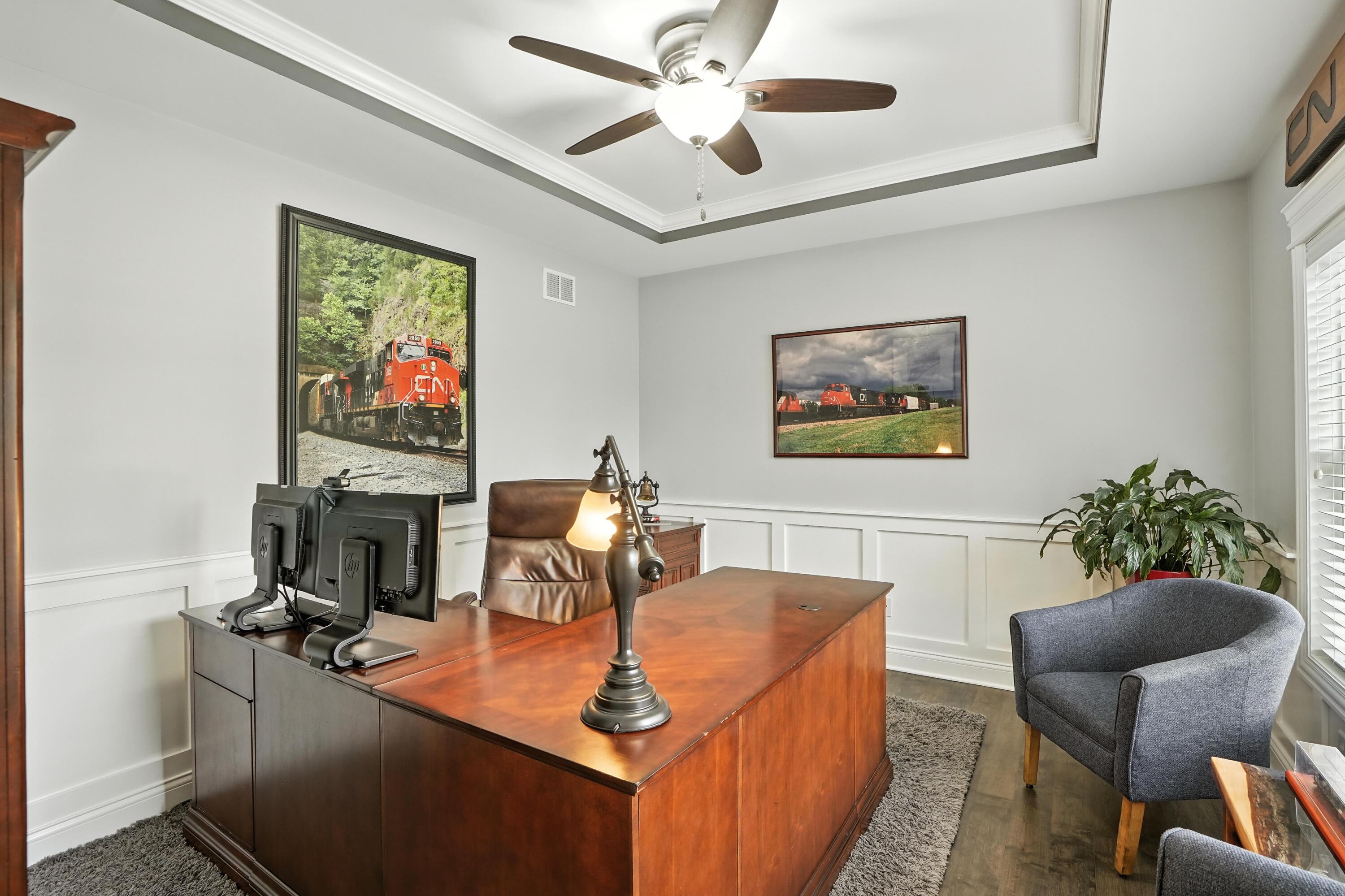 1285 Greenview Place Crown Point, IN 46307 - Photo 8 of 51 a dining room with furniture and a flat screen tv