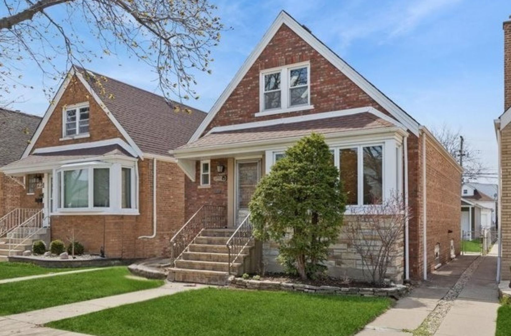 6140 South Kostner Avenue Chicago, IL 60629 - Photo 2 of 24 front view of a house with a yard