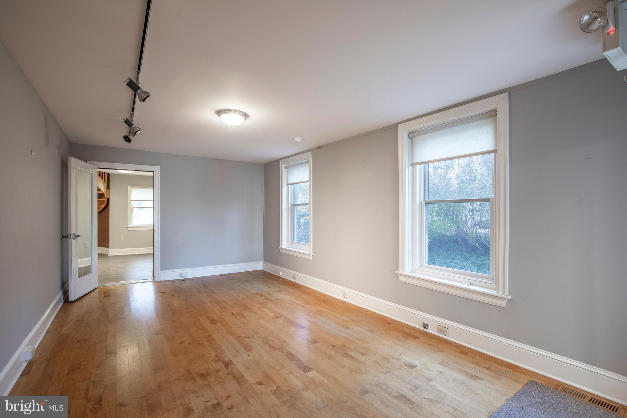 169 North Main Street Doylestown, PA 18901 - Photo 21 of 53 a view of an empty room with a window and wooden floor