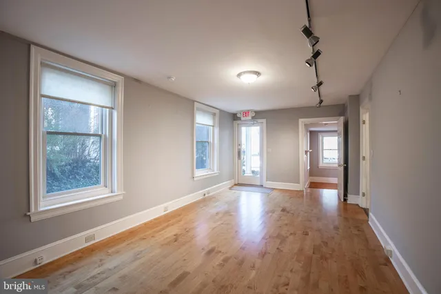 a view of an empty room and window