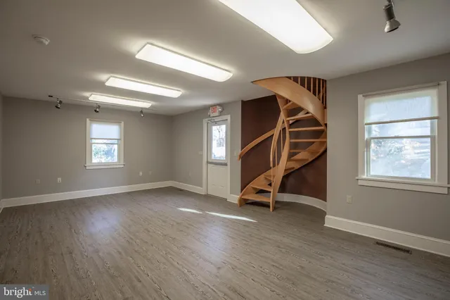 a view of entryway with wooden floor