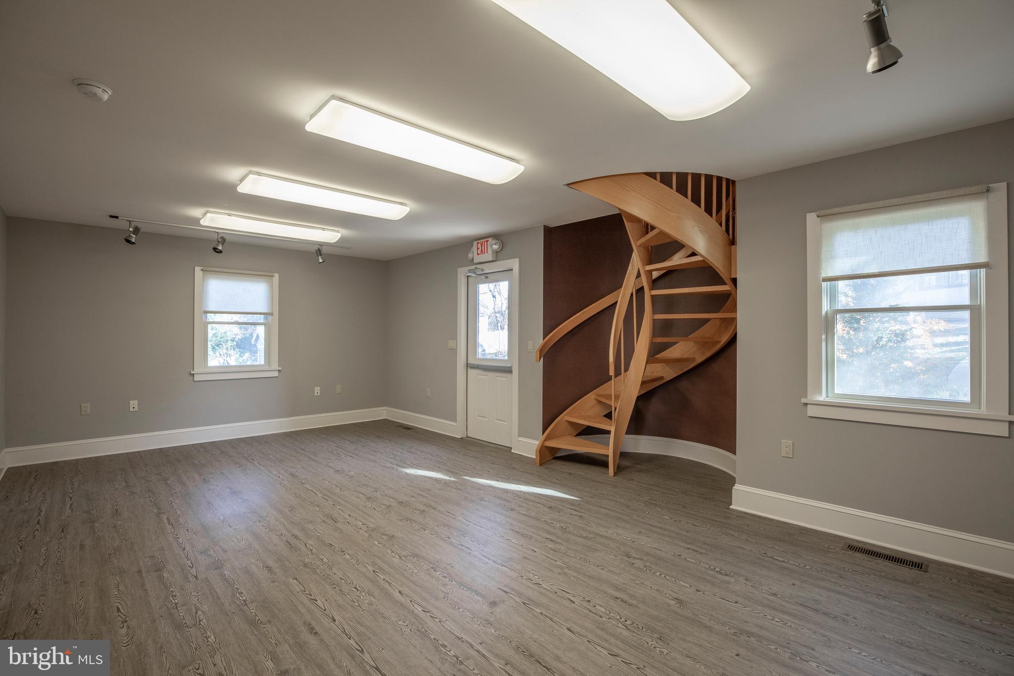 169 North Main Street Doylestown, PA 18901 - Photo 29 of 53 a view of an empty room with stairs and a window