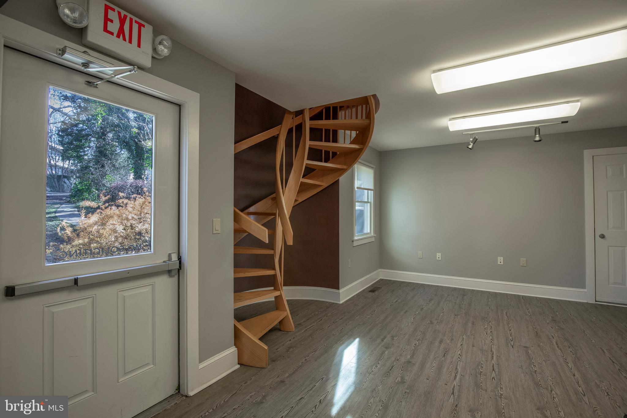 169 North Main Street Doylestown, PA 18901 - Photo 30 of 53 a view of an empty room with wooden floor and stairs