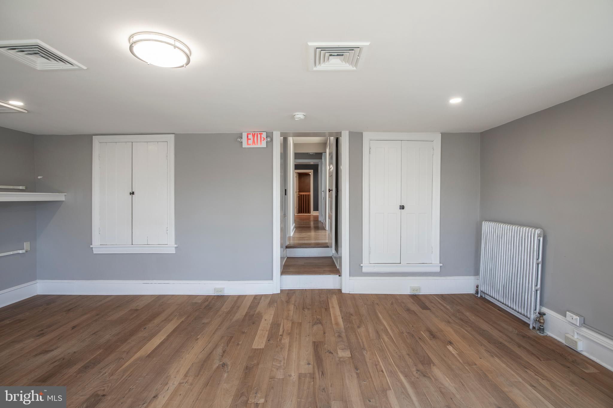 169 North Main Street Doylestown, PA 18901 - Photo 41 of 53 a view of empty room with wooden floor and fan
