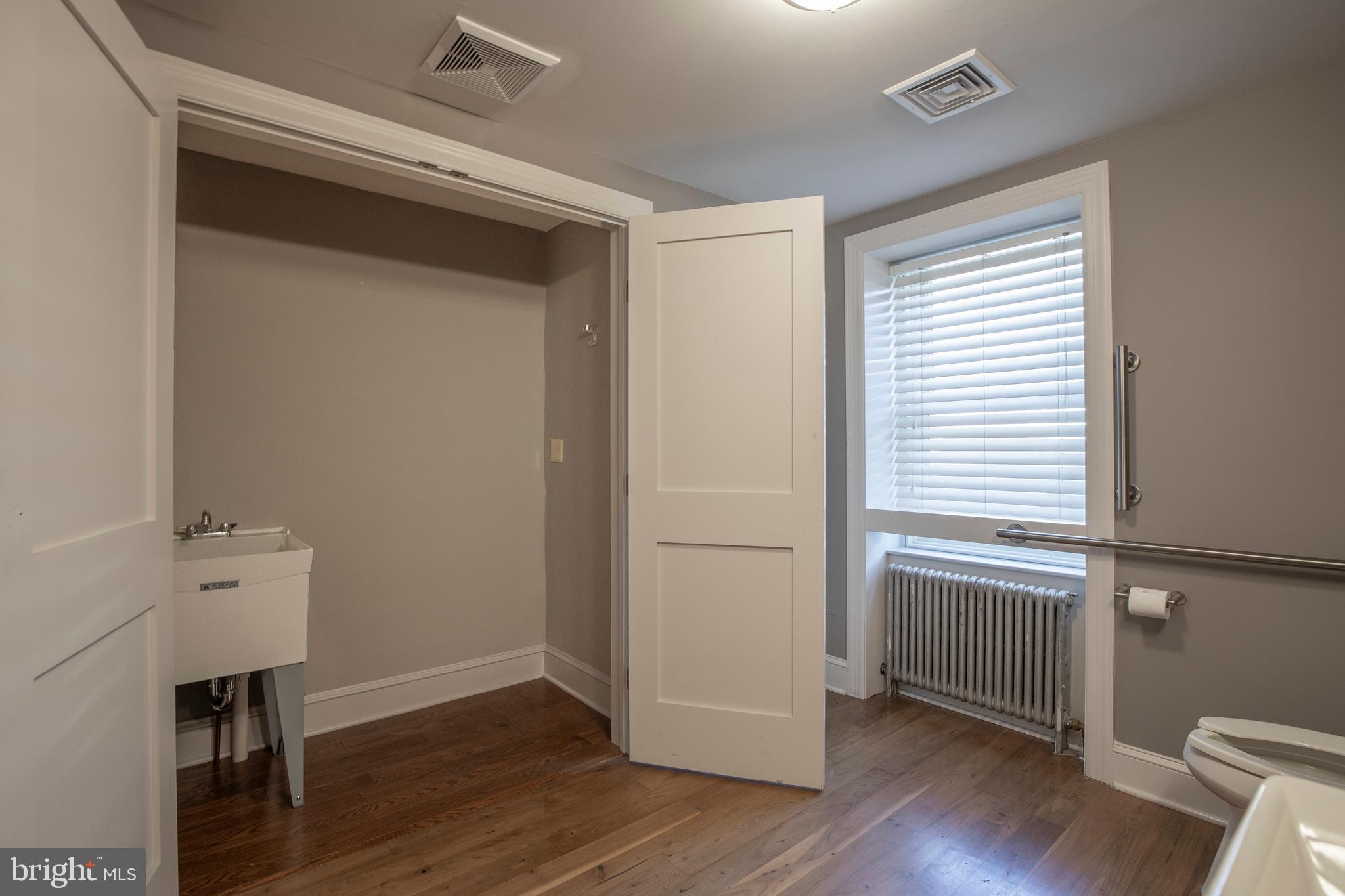 169 North Main Street Doylestown, PA 18901 - Photo 51 of 53 an empty room with wooden floor and closet
