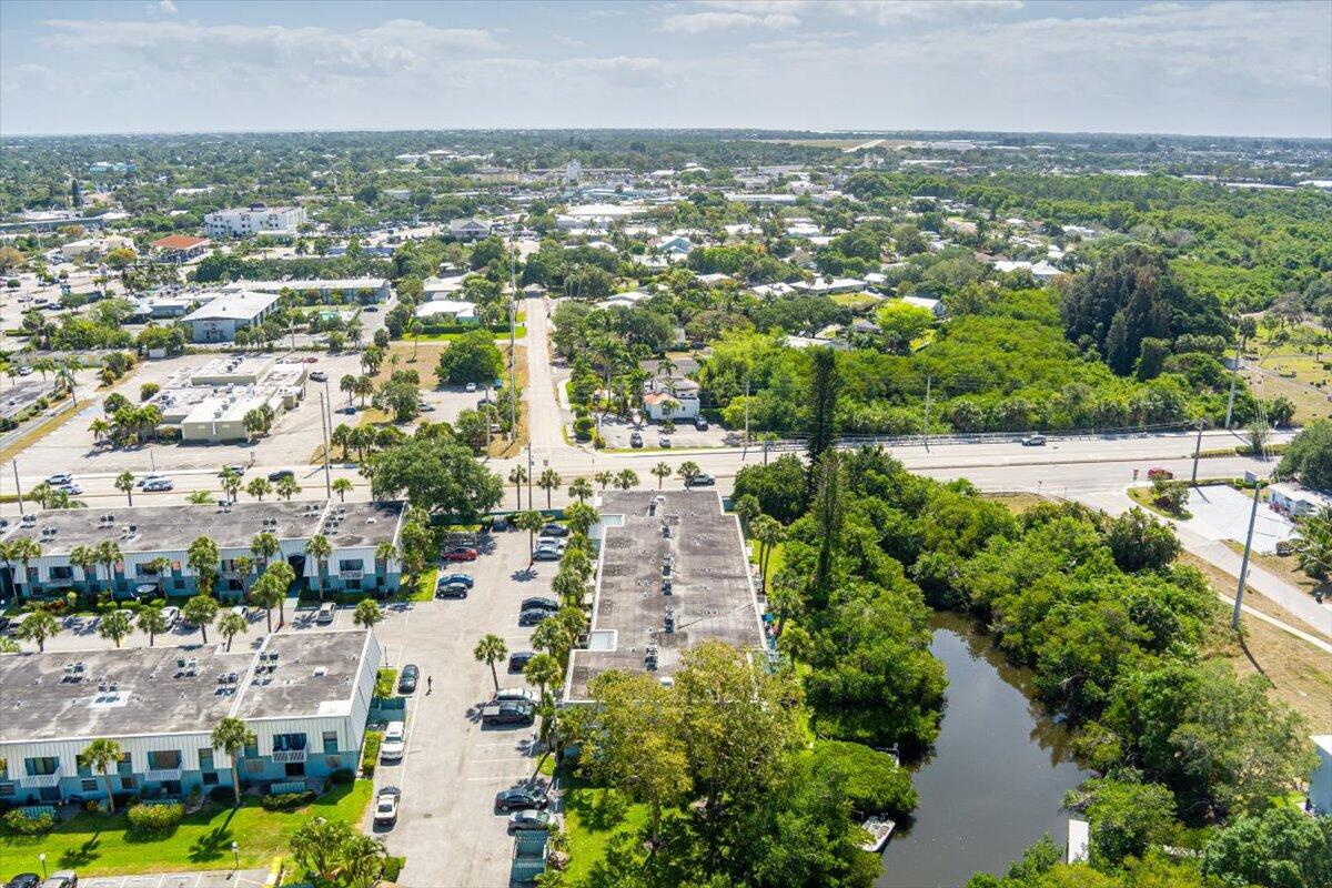 950 South Kanner Highway, Unit E4 Stuart, FL 34994 - Photo 30 of 33 an aerial view of a city with lots of residential buildings