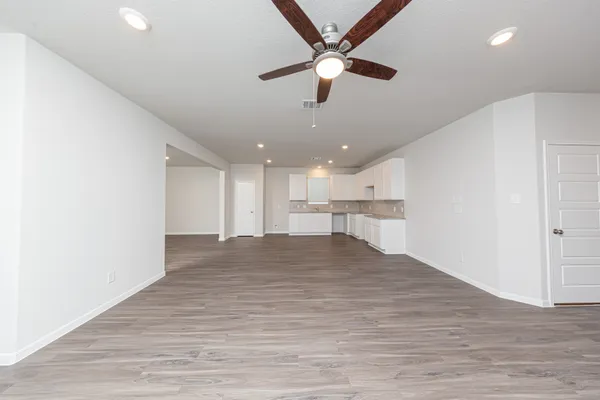 a view of a kitchen with a dishwasher and cabinets