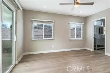 a bathroom with a tub shower and sink