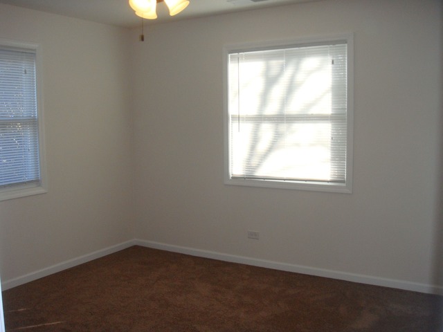 5718 South Peck Avenue Countryside, IL 60525 - Photo 7 of 12 an empty room with a window