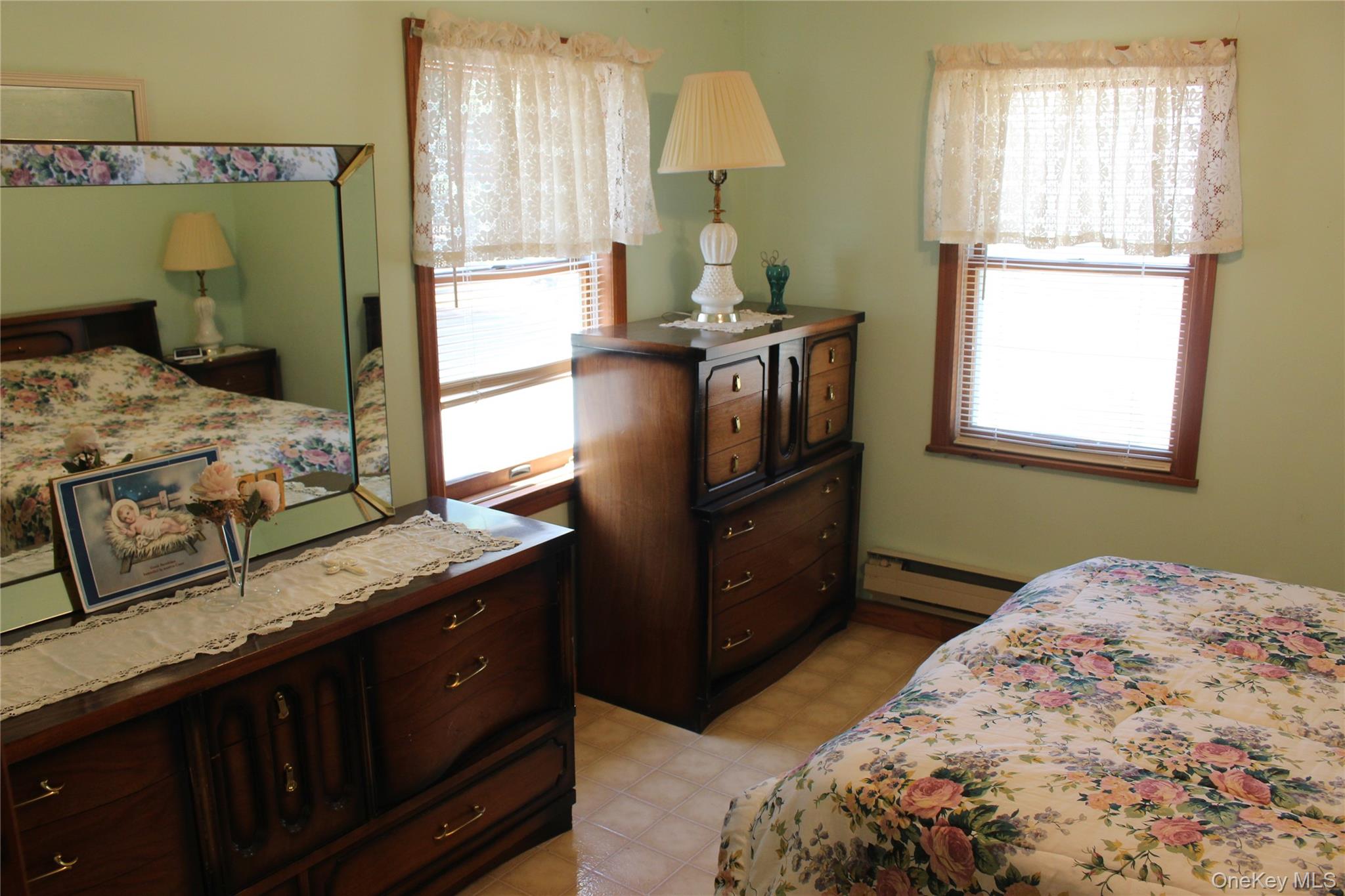 154 Britman Road Mongaup Valley, NY 12762 - Photo 12 of 38 a bedroom with a bed and a dresser