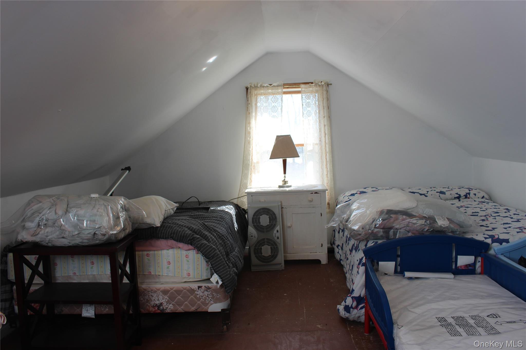154 Britman Road Mongaup Valley, NY 12762 - Photo 19 of 38 a bed room with furniture and a window