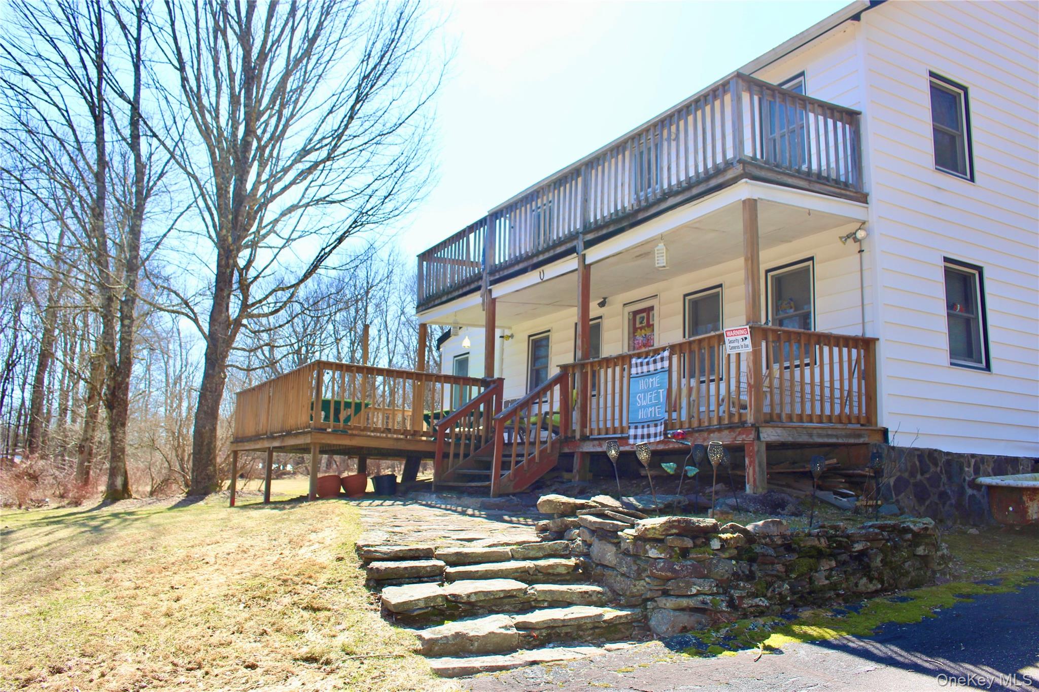 154 Britman Road Mongaup Valley, NY 12762 - Photo 2 of 38 a view of a house with a patio