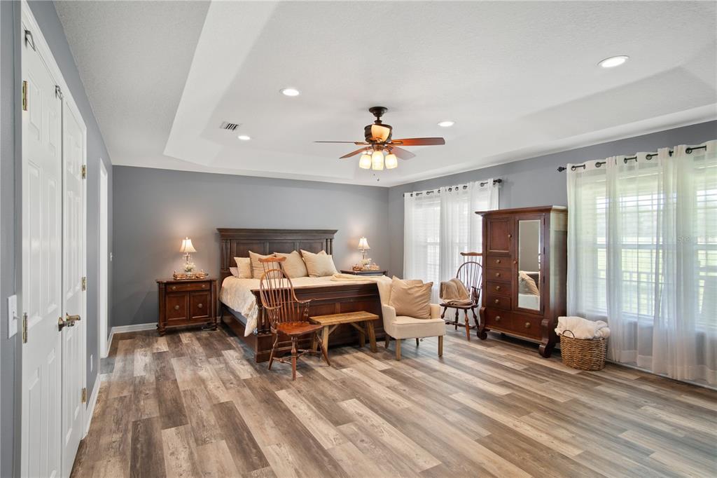 9045 Lake Hatchineha Road Kissimmee, FL 34759 - Photo 27 of 47 a bedroom with furniture and a window
