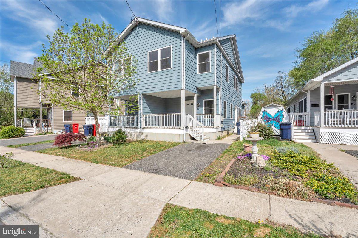 25 Eagle Street Bridgeton, NJ 08302 - Photo 1 of 24 a front view of a house with a yard