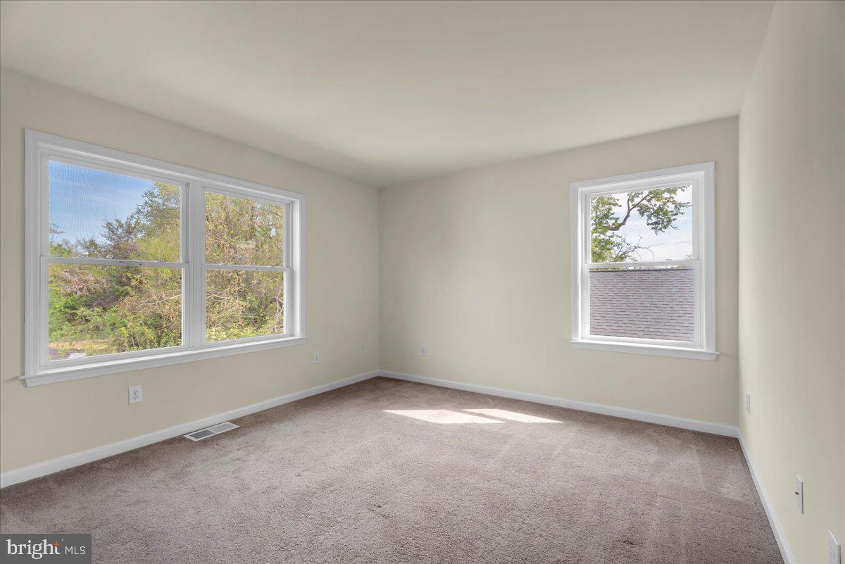 25 Eagle Street Bridgeton, NJ 08302 - Photo 18 of 24 an empty room with windows