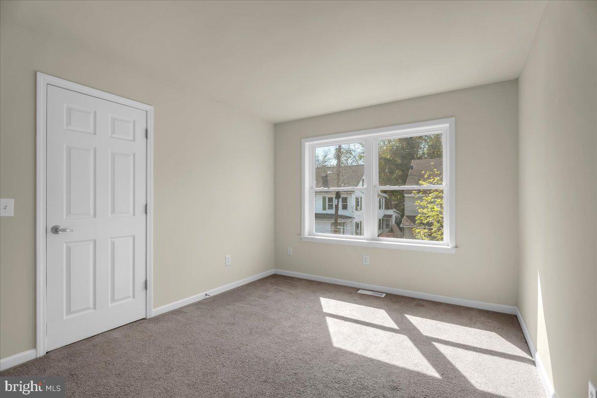 25 Eagle Street Bridgeton, NJ 08302 - Photo 22 of 24 an empty room with windows