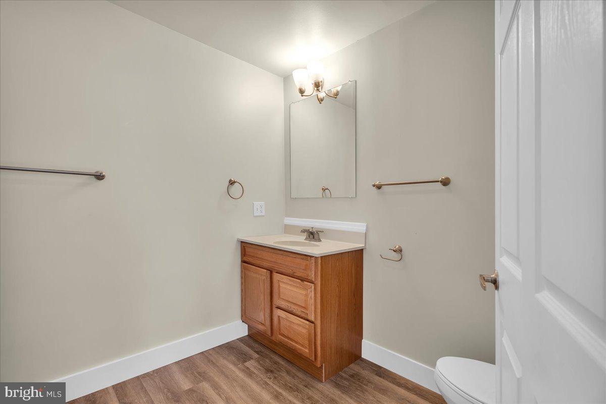 25 Eagle Street Bridgeton, NJ 08302 - Photo 7 of 24 a bathroom with a sink toilet and shower