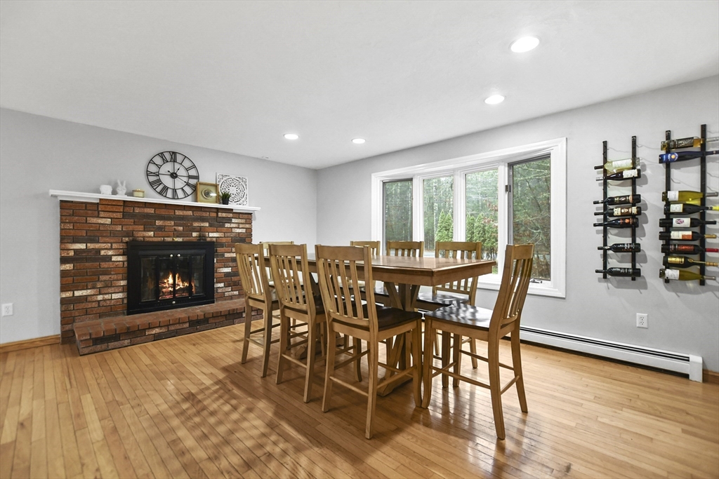 49 Howland Road Lakeville, MA 02347 - Photo 8 of 40 a dining room with furniture and wooden floor