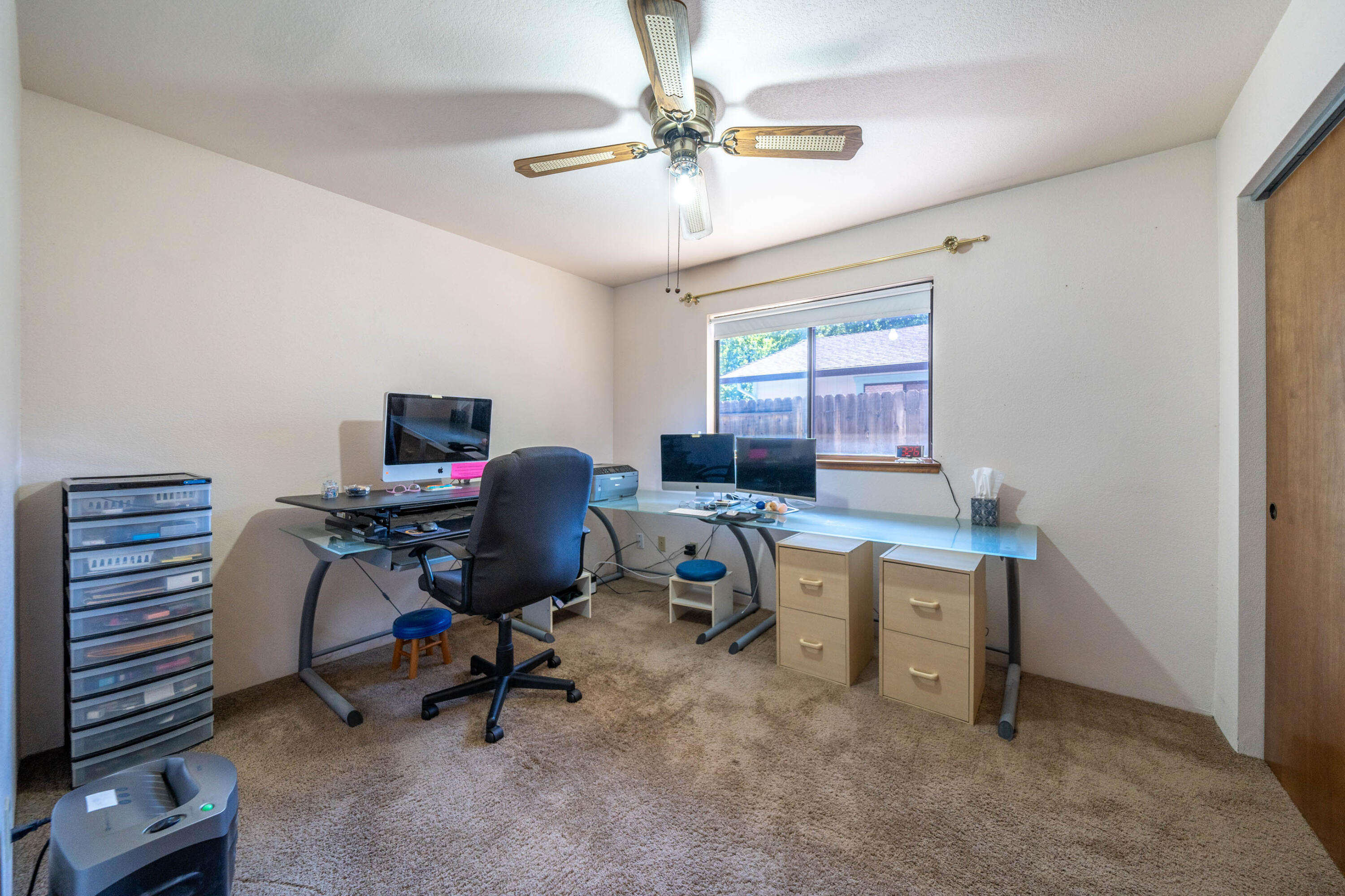2285 Snow Lane Redding, CA 96003 - Photo 21 of 45 a view of a workspace with furniture and a window