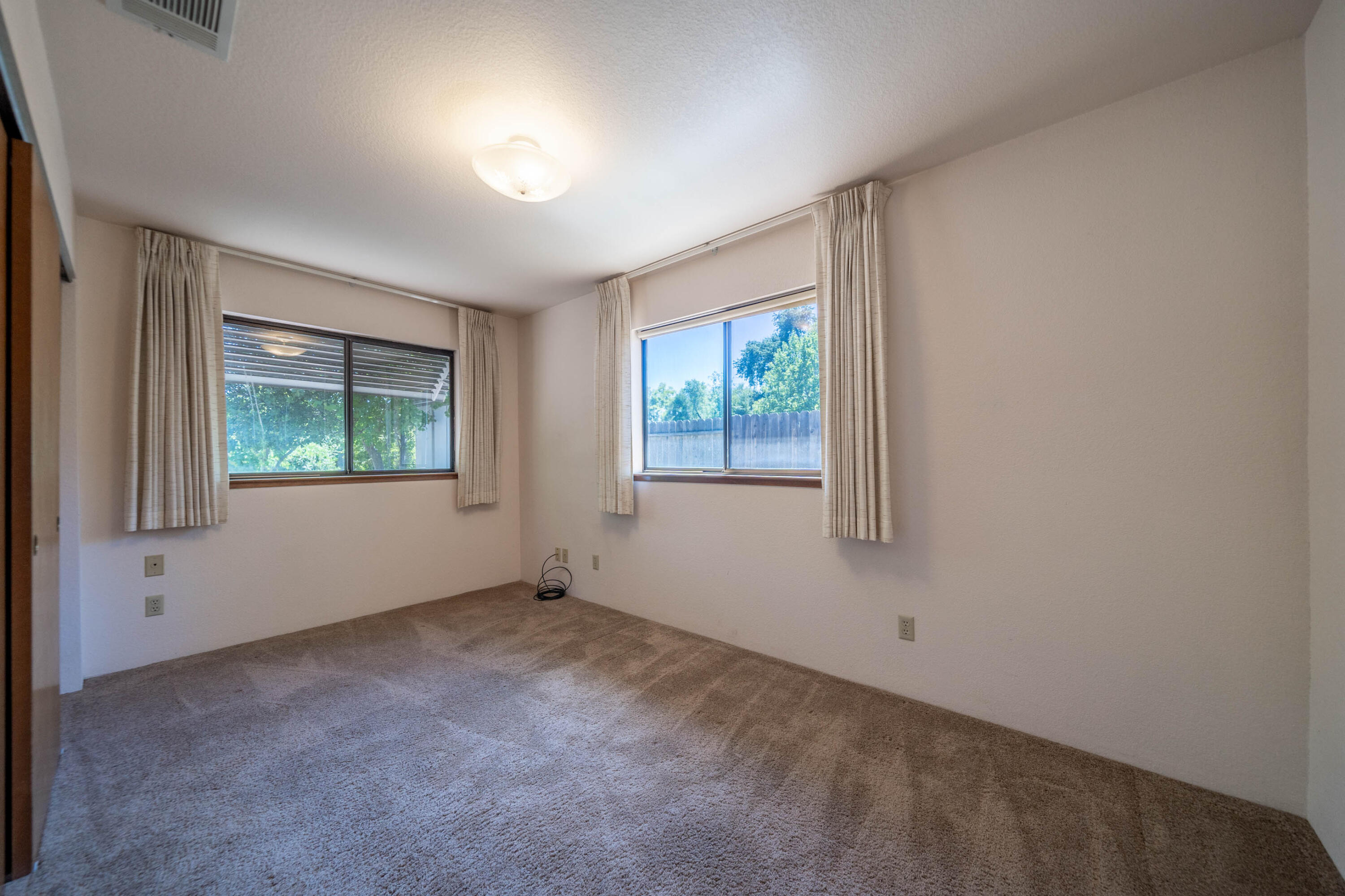 2285 Snow Lane Redding, CA 96003 - Photo 23 of 45 an empty room with windows
