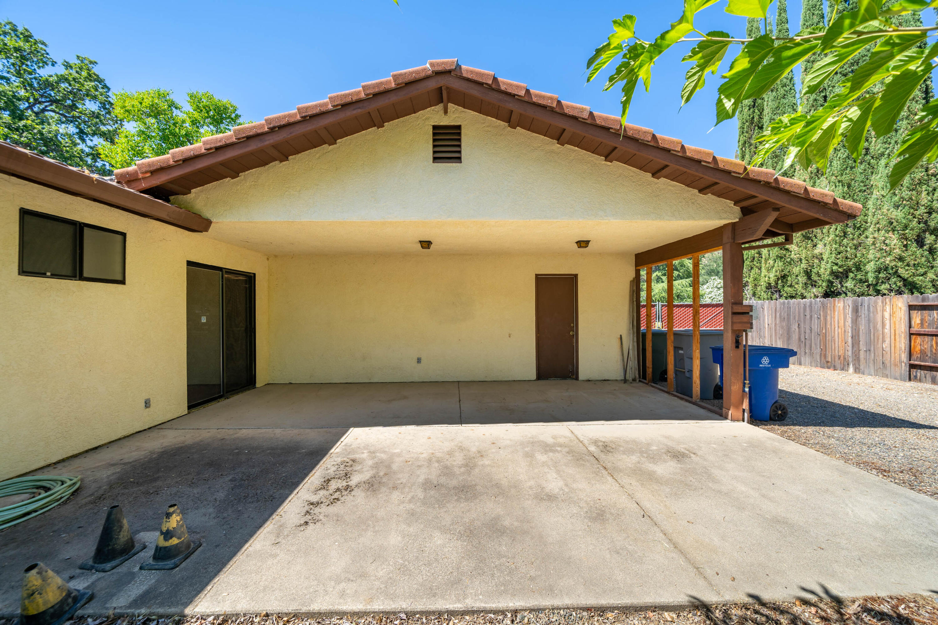 2285 Snow Lane Redding, CA 96003 - Photo 28 of 45 a front view of a house with a garage