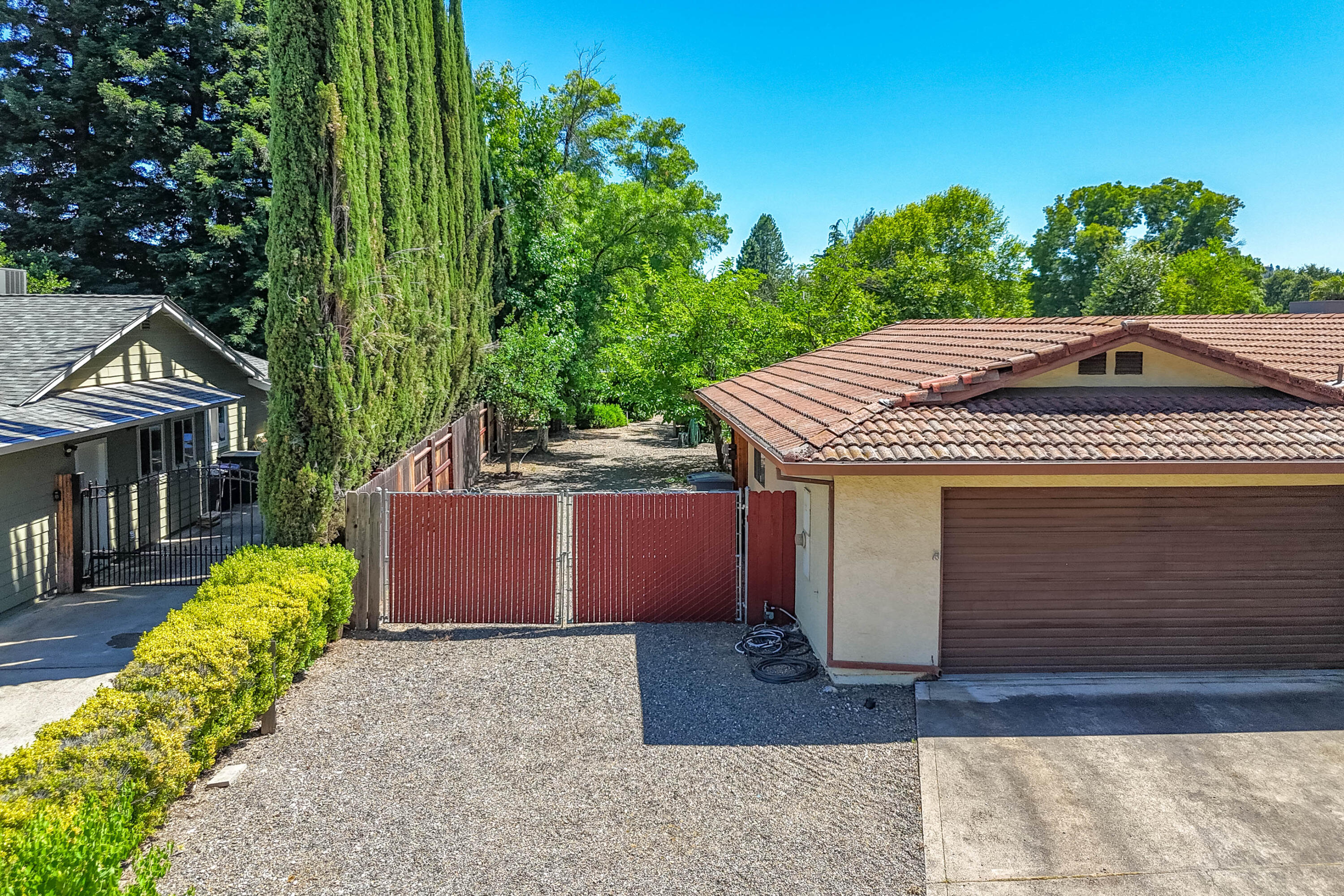 2285 Snow Lane Redding, CA 96003 - Photo 4 of 45 a view of a house with a yard