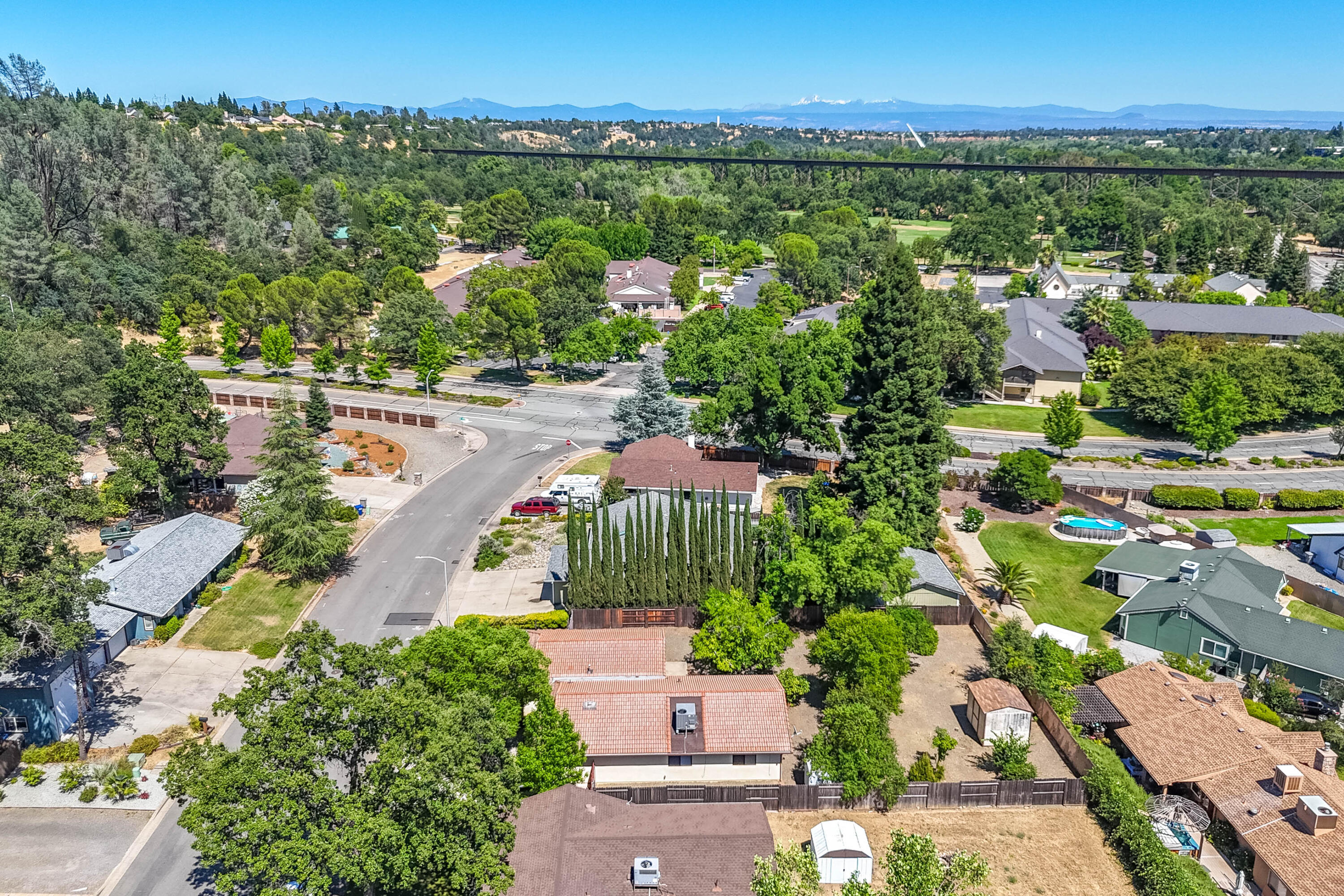 2285 Snow Lane Redding, CA 96003 - Photo 41 of 45 an aerial view of a city with lots of residential buildings ocean and mountain view in back