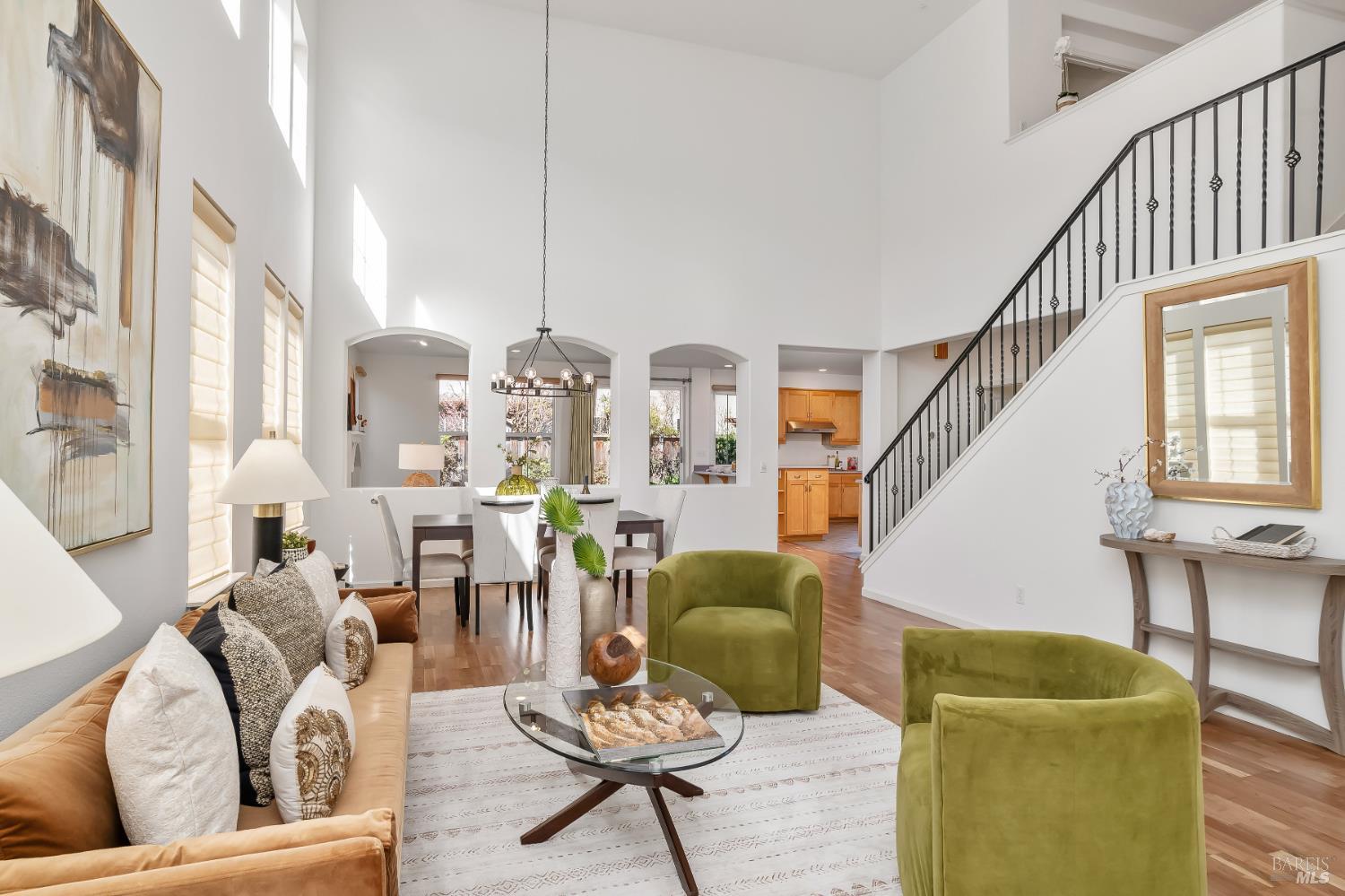 62 Richardson Road Novato, CA 94949 - Photo 1 of 26 a living room with furniture and a chandelier
