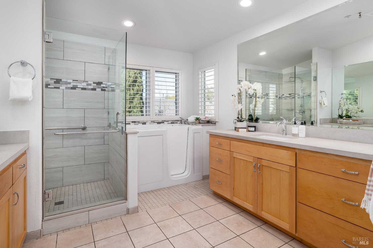 62 Richardson Road Novato, CA 94949 - Photo 16 of 26 a bathroom with a shower sink and mirror