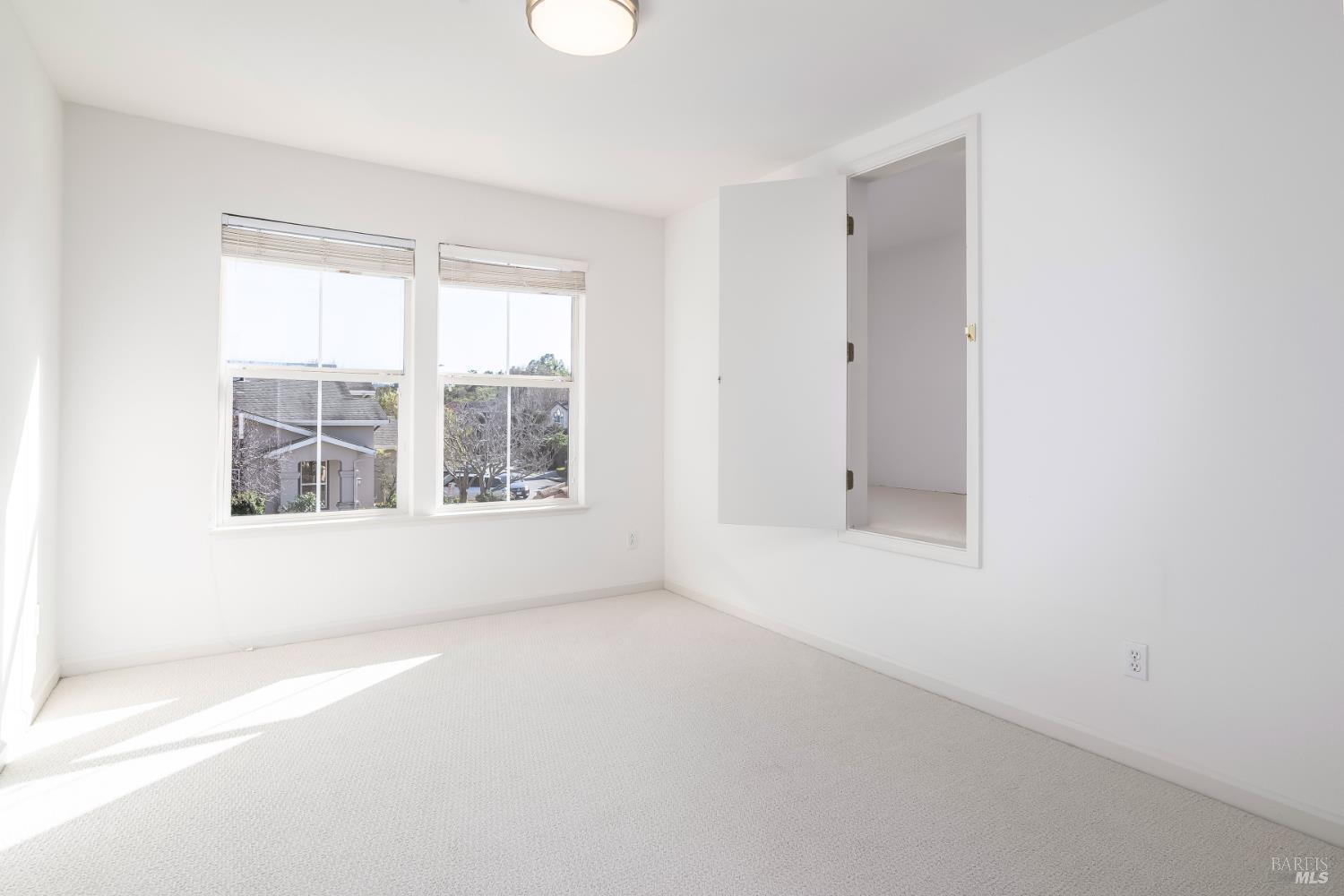 62 Richardson Road Novato, CA 94949 - Photo 19 of 26 a view of an empty room with a window