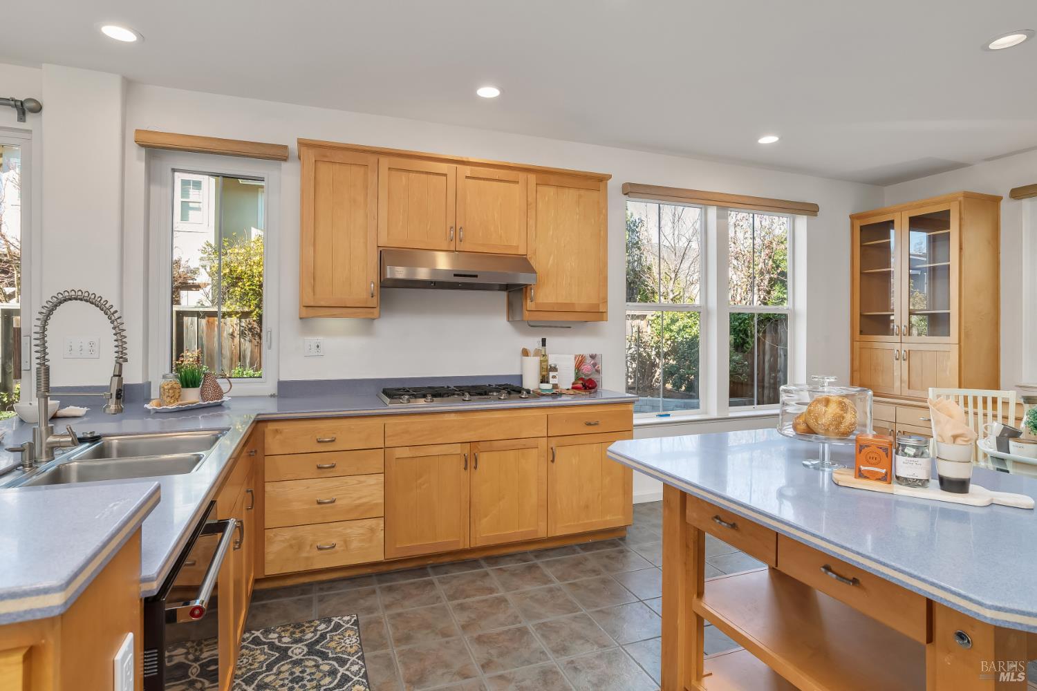 62 Richardson Road Novato, CA 94949 - Photo 9 of 26 a kitchen with stainless steel appliances granite countertop a sink a stove and a counter space