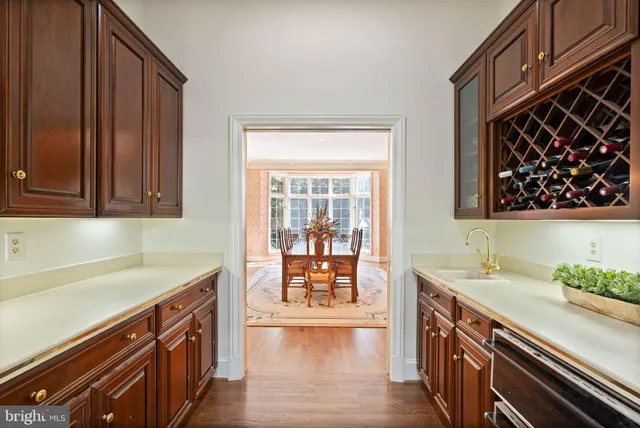 a view of a entryway door with a rug and a window