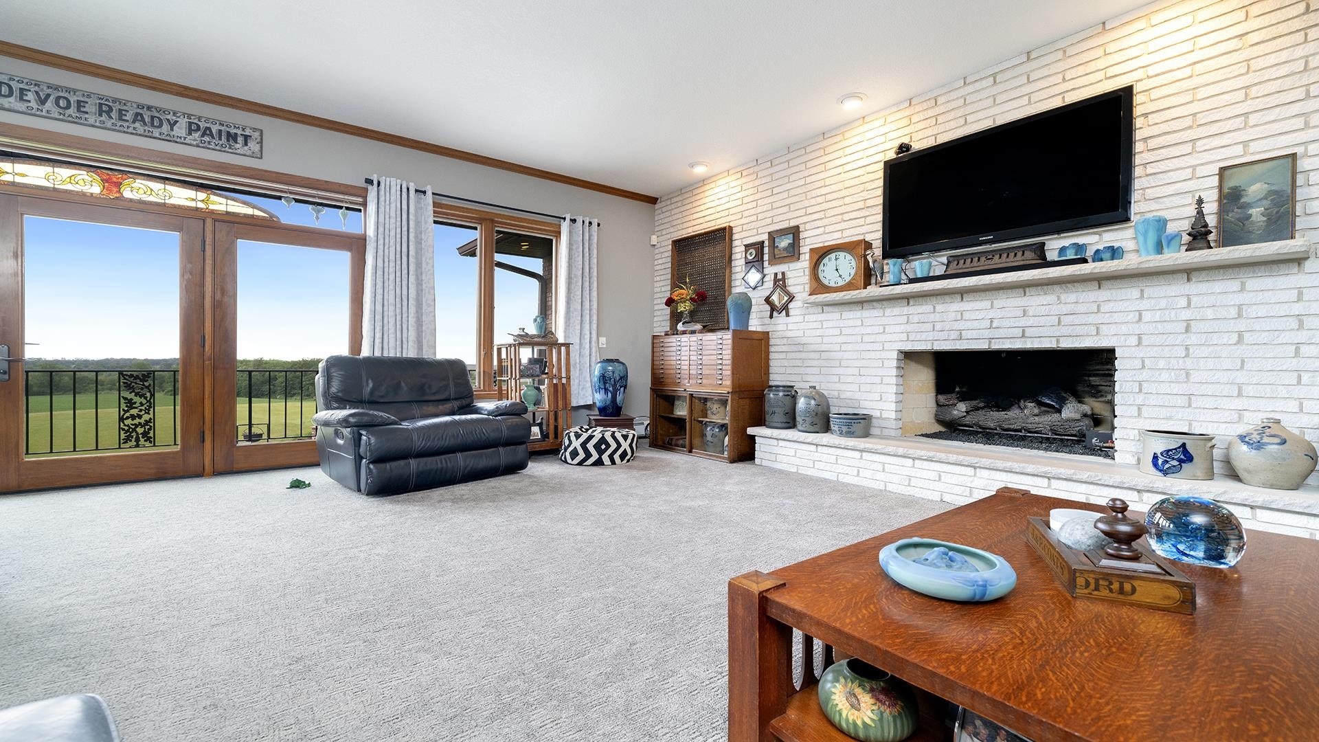 2765 West Pines Road Oregon, IL 61061 - Photo 15 of 79 a living room with furniture and a fireplace